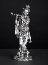 Silver-plated Lord Krishna statue, flute-playing with ornate crown and jewelry