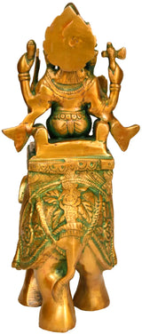 Brass Ganesha riding elephant statue back view, green floral base, 11 in