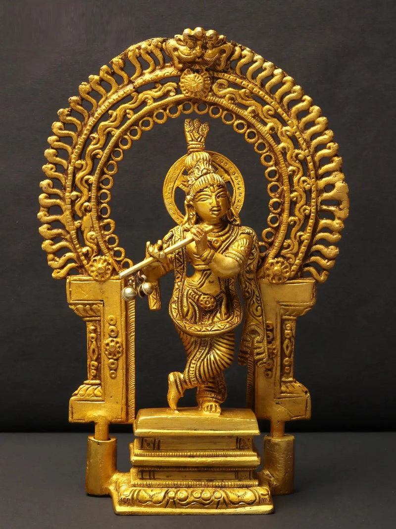 Brass Idol of Lord Krishna Playing the Flute on a Kirtimukha Pedestal 8 inches