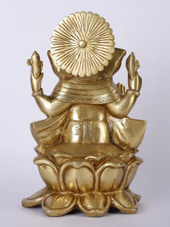 Lord Ganpati Ji idol seated on lotus, golden finish, back view with halo disc