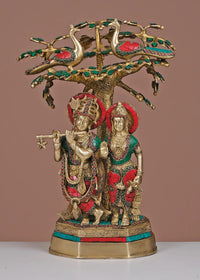 Brass Radha-Krishna sculpture under tree, colorful inset work, 19-inch standing