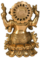 Back view brass Ganesha statue with raised arms and lotus base