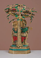 Brass Radha-Krishna sculpture with detailed tree trunk, green/red inlay, 19-inch