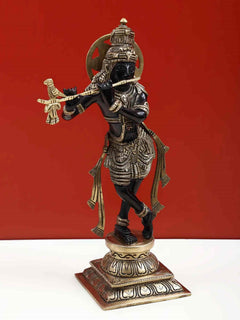 Black brass Lord Krishna playing the flute statue on ornate base, 12 inch