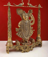 Gold-toned brass Dwarkadhish statue with sculpted pedestal and raised right hand