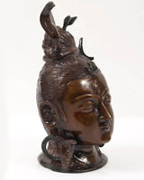AONA Lord Shiva head brass statue, side view with raised arms and textured hair