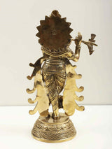 Natural brass Krishna flute statue, rear view with ornate crown and flowing details; 13-inch