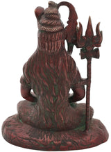 Rear view Shiva idol draped in tiger-skin style, trident beside seated figure, 10-inch