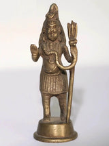 Small brass Lord Shiva statue with raised hands and trident staff, standing on base