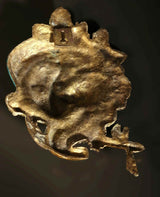 Back view of Krishna brass wall hanging mask, weathered gold tone relief