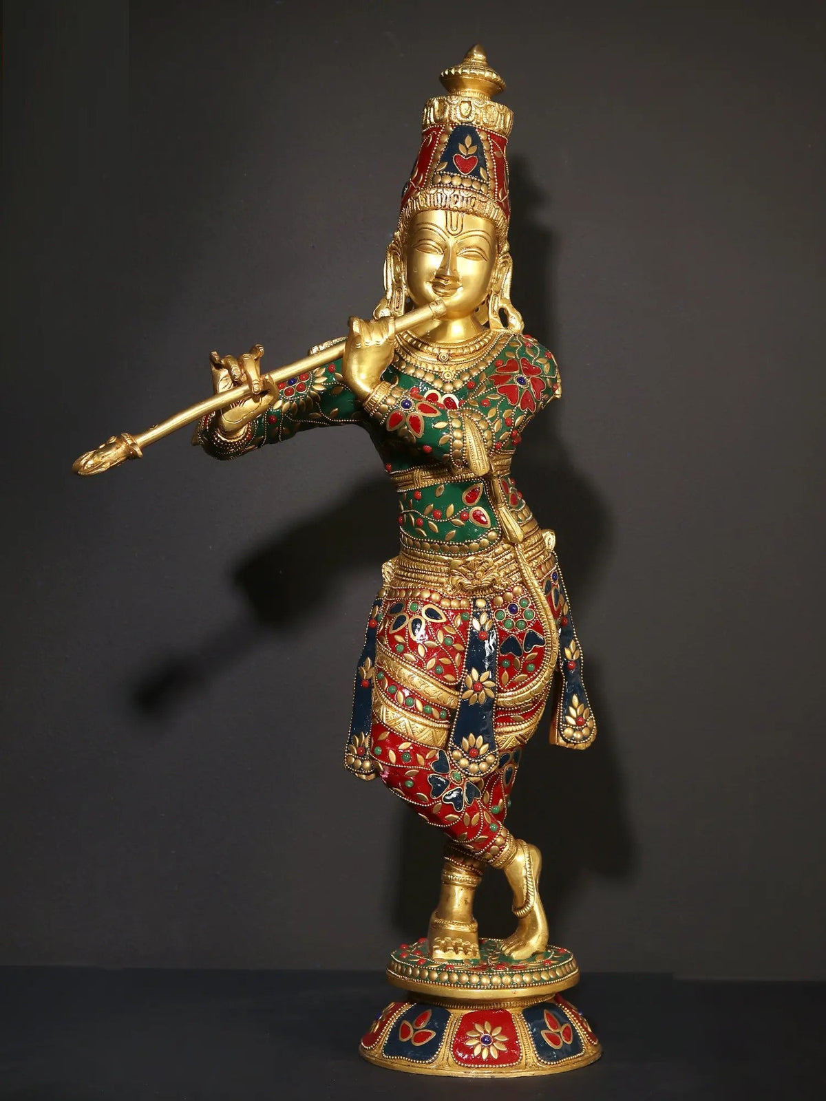 Brass Krishna flute statue with red and green inlay work, 23 inches