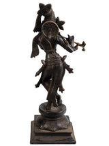 Handmade brass statue of Lord Krishna, side view with raised hand, on square base