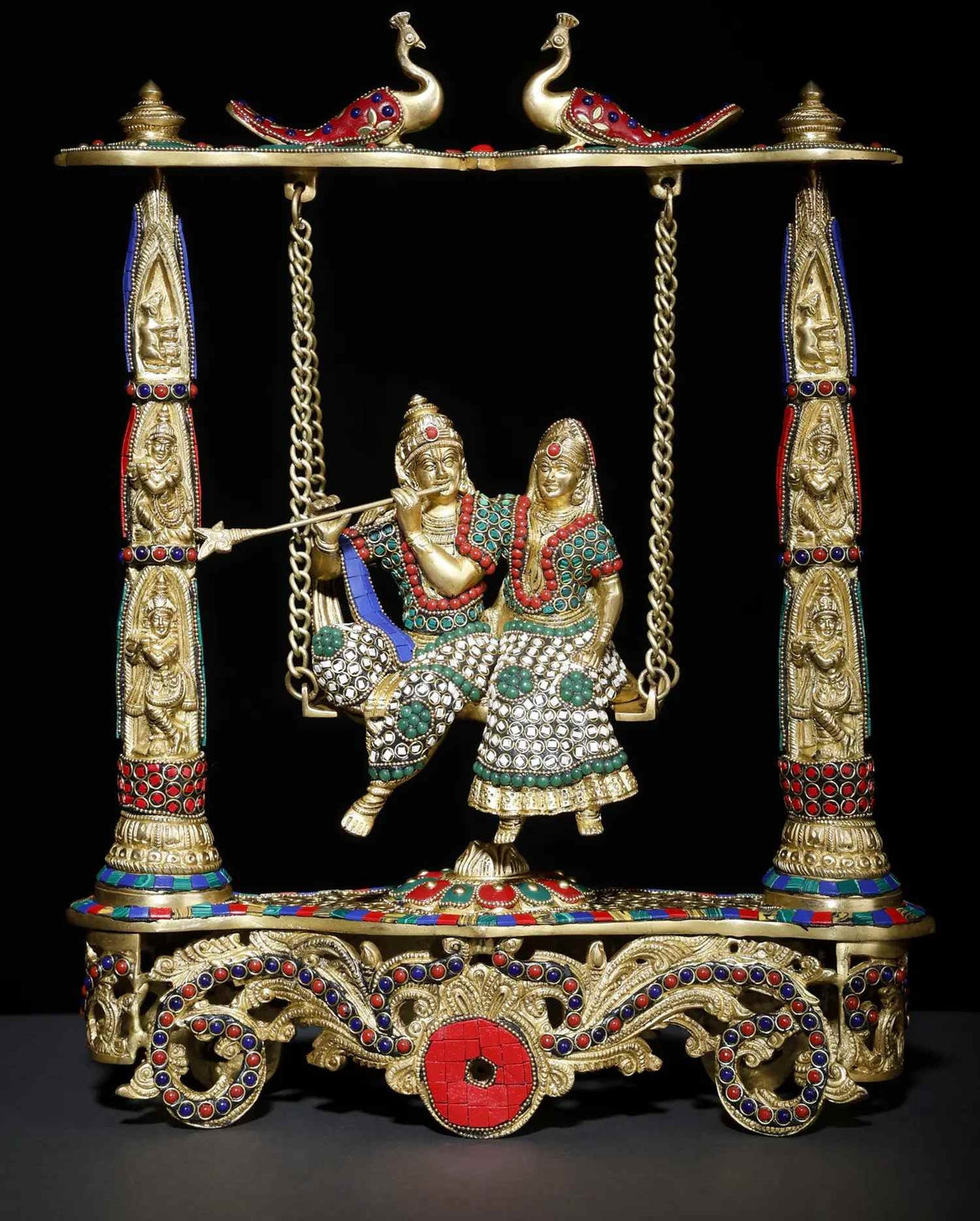 Brass Radha-Krishna swing statue with jeweled inlay, ornate base, twin hanging chains
