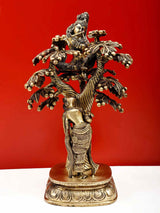 Natural brass Krishna statue on tree with Radha standing beneath, detailed ornamented base