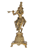 Natural brass Lord Krishna statue holding flute on tall pedestal, 12 inch