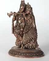Rose-gold brass Radha and Krishna figurine, standing on round ornate base