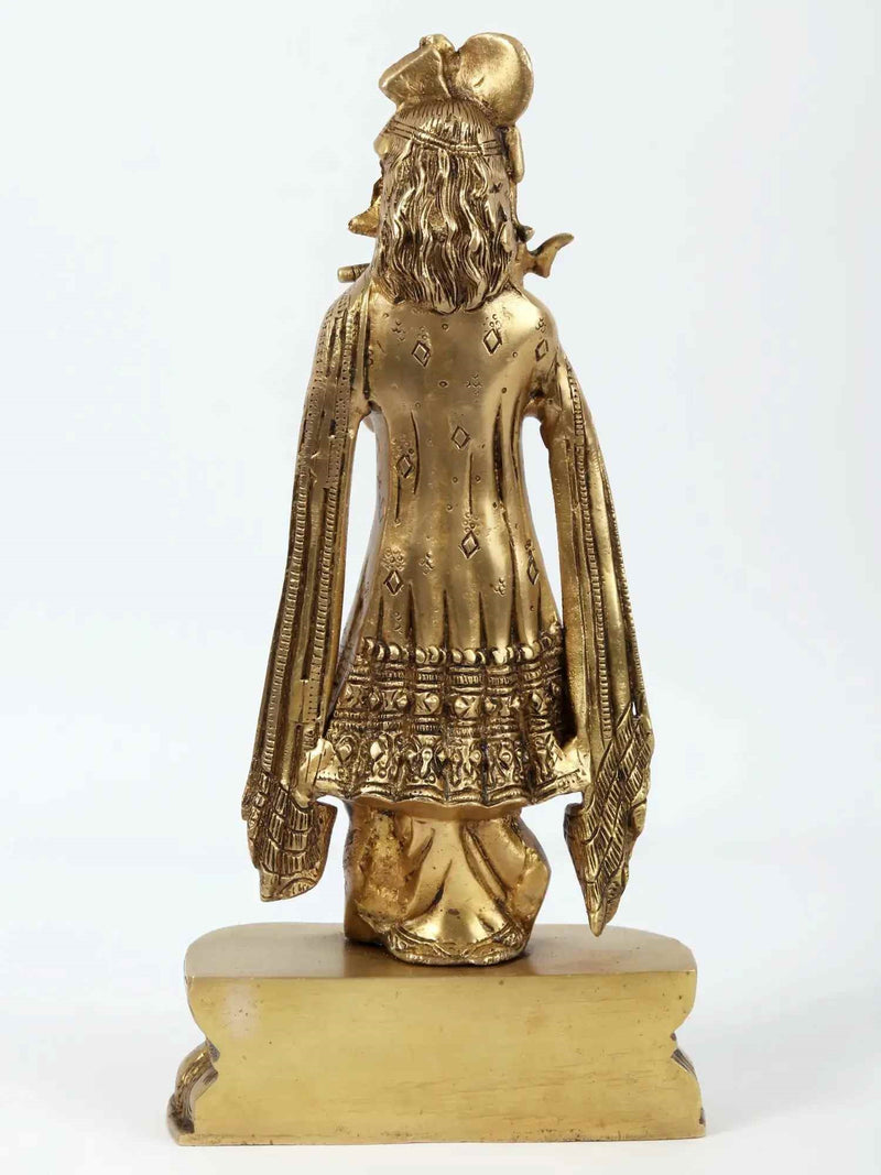 Brass statue of Krishna Gopala traditionally dressed and playing the flute 13 Inches