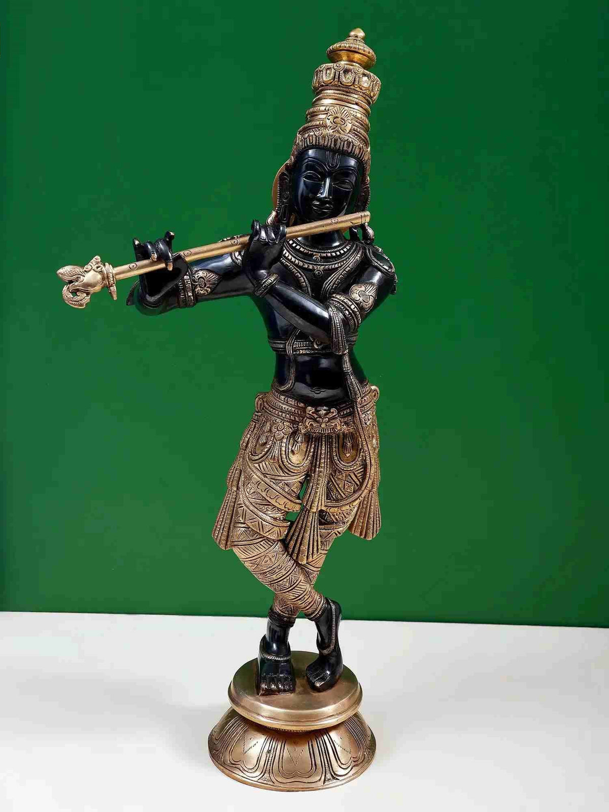 Handmade black and gold brass Shri Krishna flute statue, standing with flute