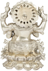 Ganesha statue back halo detail, two arms raised, seated on lotus base, silver tone