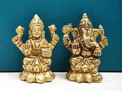 Brass Ganesha and Lakshmi statues, two-inch figurines with detailed raised faces
