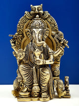 Brass 6-inch Ganesha sculpture, enthroned with ornate crown and halo