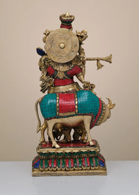 Brass Krishna flute sculpture with cow, detailed back, multicolor, 17 in