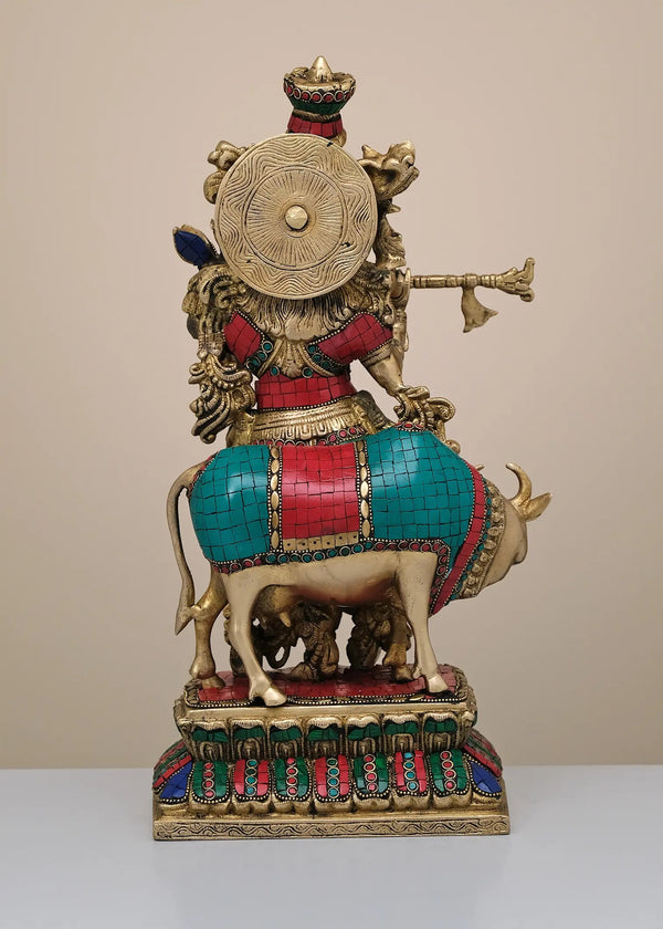Brass Sculpture of Krishna Playing the Flute with His Cow 17 Inches Study Setting