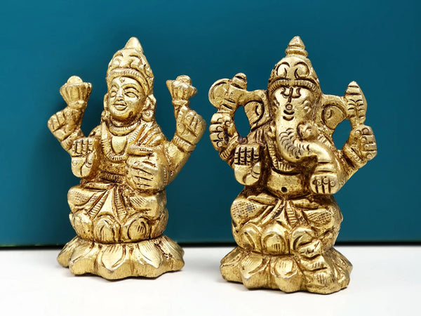 Brass statue featuring small depictions of Lord Ganesha and Goddess Lakshmi 2 Inches Entryway Setting