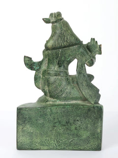 Krishna flute-playing idol, back/side view, seated on pedestal base, green patina