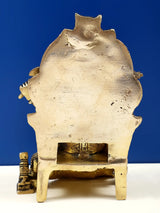 Back view of brass 6-inch enthroned Ganesha sculpture, textured metal backplate