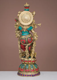 Handmade brass Krishna flute sculpture with circular disc, colorful inlay details