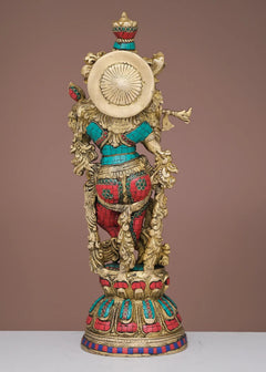 Handmade brass Krishna flute sculpture with circular disc, colorful inlay details