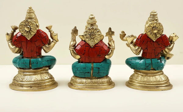 Small Brass Idol of Lakshmi, Ganesha, and Saraswati with Blessing Pose and Inlay Work 4 inches Study Setting