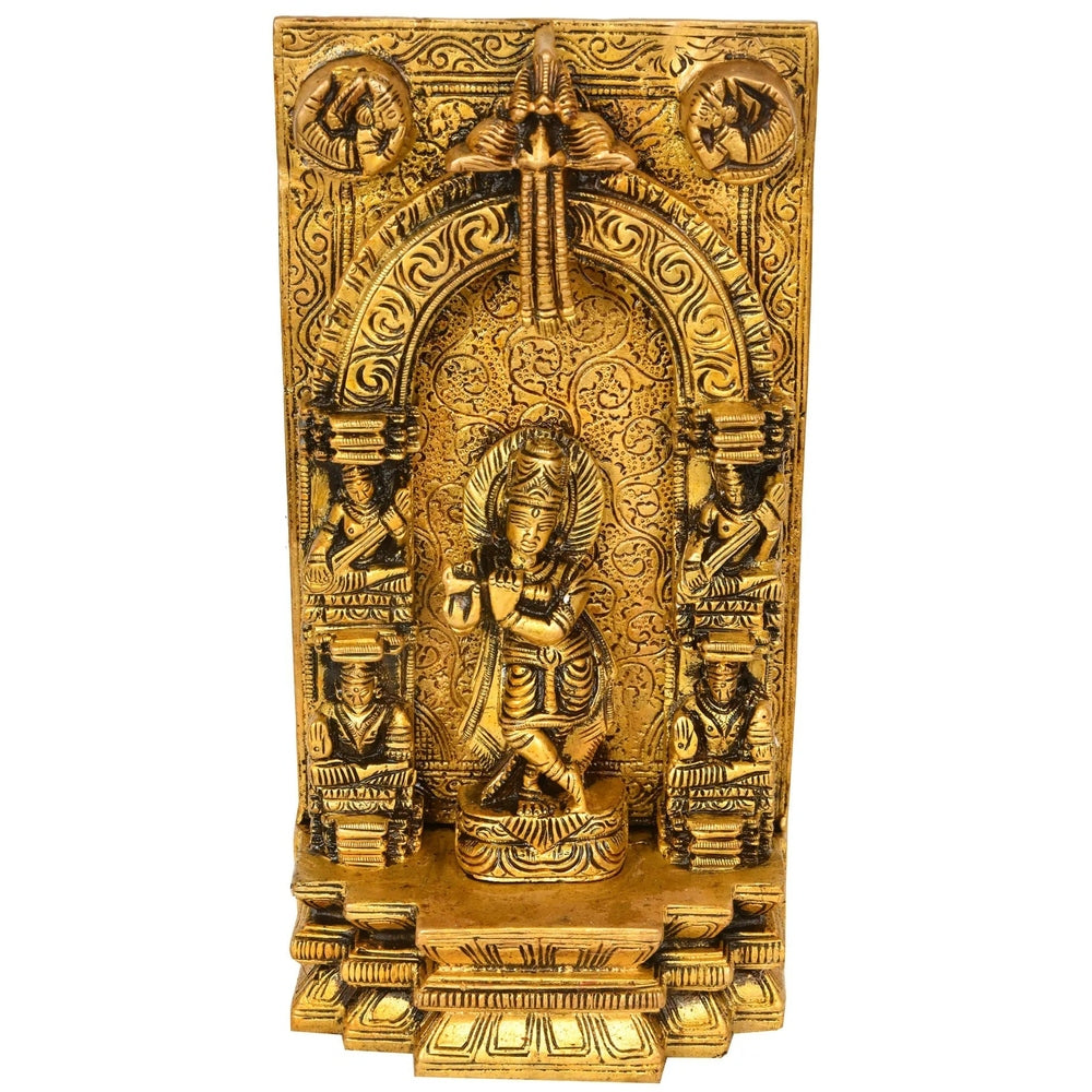 Brass Krishna flute idol on almond-shaped aureole relief figurine