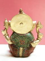 Brass Lord Ganesha statue, back view with round back detail and jeweled dress