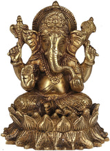 Handmade brass Kamalasana Ganesha idol seated with four arms, holding modak
