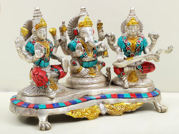 Statue made of brass depicting Lakshmi, Ganesha, and Saraswati 6 inches Entryway Setting