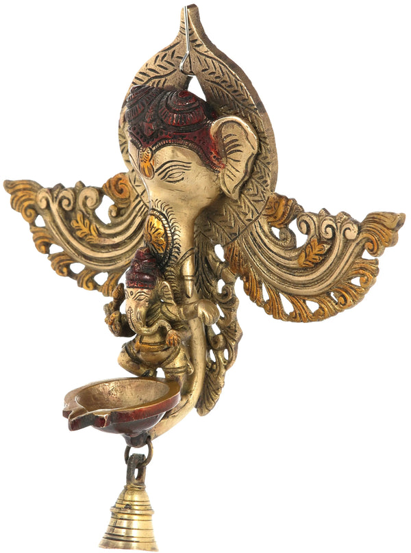 Brass Wall Hanging of Dancing Ganesha Nestled in Ganesha's Trunk with Lamp and Temple Bell 10 inches