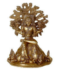 Brass Lord Dakshinamurti Shiva sculpture, seated figure with ornate halo and pedestal