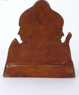 Small brass Trimurti statue back view with seated figure and base