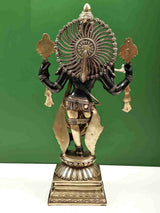 Handmade black brass Krishna statue from back view, fluting fan details and gold patina, 24 in