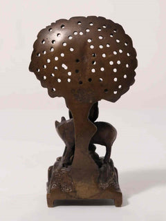 Brass Venugopal (Krishna) flute statue back view with perforated tree canopy