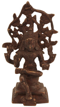 Handmade brass Dakshinamurti Shiva statue, seated figure with detailed halo, 6-inch