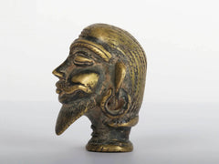 Testa di Shiva in miniatura in ottone, vista laterale, 2 pollici
