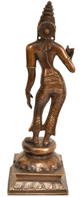 Brass goddess idol in side view, arms crossed, ornate jewelry, 11-inch