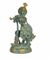 Antique brass Krishna sculpture with cow, flute, ornate gold accents