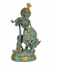 Antique brass Krishna sculpture with cow, flute, ornate gold accents
