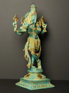 Krishna as Vishnu avatar statue in turquoise patina brass, side view, gold ornamented halo