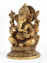 AONA brass four-armed seated Ganesha statue, ornate face and crown details