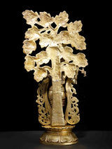 Brass Krishna statue with leafy tree canopy, detailed base, 23-inch decor